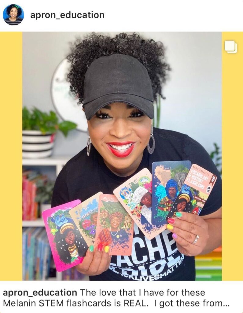 LaNesha holiding Melanin STEM flashcards