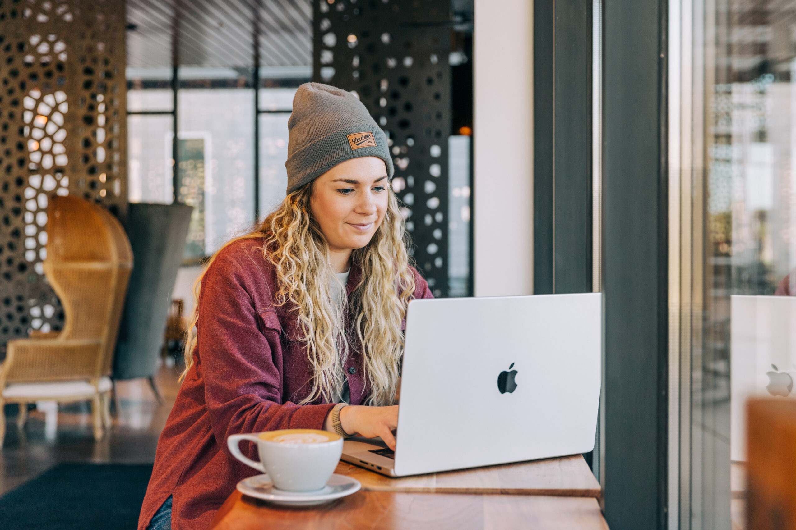 a trendy woman searching where to buy website templates on Black Friday